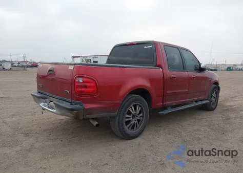 2002 Ford F-150 Lariat/Xlt z USA, uszkodzony, nr VIN 1FTRW07672KD77500